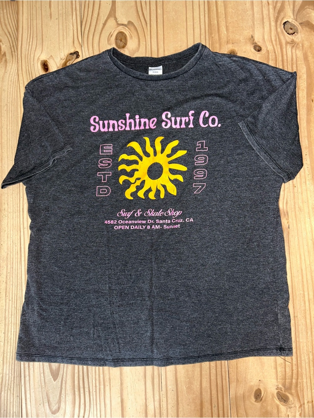 No Boundaries Women’s Charcoal Tee with Pink Logo & Yellow Sun